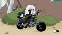 S5e14 Simon and Marcy on motorcycle