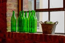 Glass bottles on a windowsill