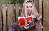 Grimescommchic.png (418 KB) Grimes using The Communist Manifesto as a prop to satirically "troll" the paparazzi, illustrating the aesthetic's modern function as irony and performance.