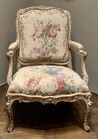 Rococo: À la reine armchair, mid 18th century, carved and gilded walnut, upholstery in wool and silk tapestry