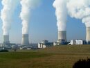 Nuclear cooling towers. Fun fact: the stuff coming out is just steam from water used to cool down the reactor