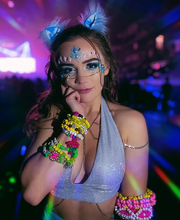 A raver wearing kandi bracelets. Photo credit: @sunflowerraver.