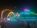 Neon carnival alien abduction