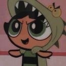 Buttercup from PPG, wearing a dinosaur blanket hoodie.