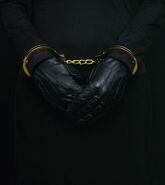 Gold handcuffs gloves.jpg (13 KB)