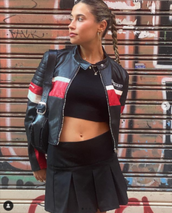 Black crop top and miniskirt combined with the iconic Motomami Biker jacket. Credit: @paauulzz