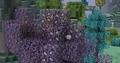 A White Apple and some Purple Fruit Leaves and Purple Crystal Leaves in Aether II.