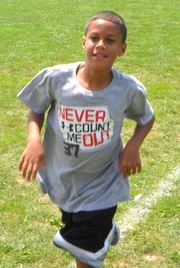 Nico running with Kids of STEEL in 2015 at 