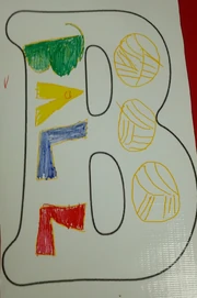 B is for Ball. Of course the balls are yellow and with lines, as that's how a  ball looks