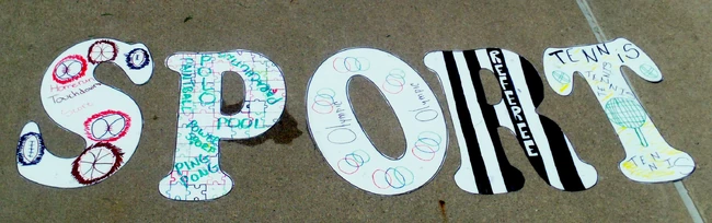 "S" for "Sport."Students did word building at the swim pool.