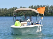 Boat-w-orange-flag