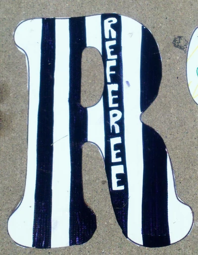 "R" for "Referee