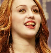 Miley as a vampire.