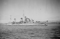 British light cruiser HMS Aurora (C12) at anchor off the coast of  in April 1942.