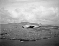 Warwick ASR Mark I, BV356 HK-E, of No. 269 Squadron RAF, based at Lagens, in flight along the coast of Terceira. BV356 was a redesignated Stage C aircraft, seen here carrying a Mark II lifeboat.