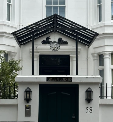Detail of the entrance. Today the property still bears the name "Green Lodge". The same name was used when Agatha was in residence.[4]
