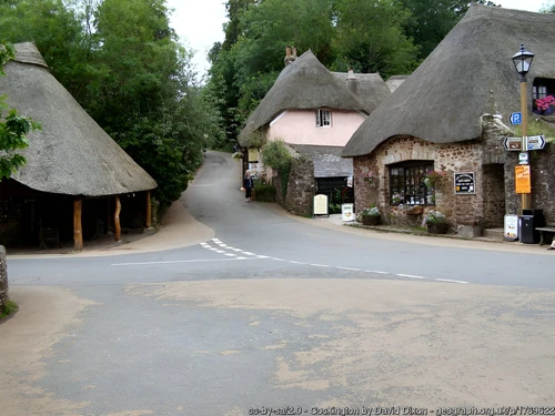 Cockington in 2007. Thatched roofs are the norm here. To the left is The Forge, now a giftshop. To the right is the Old Granary, also a giftshop.