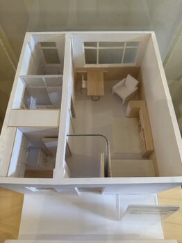 This model of a typical apartment in the building shows how small the units were. At one point the Mallowans had two and had permission to knock down the wall to join them up.