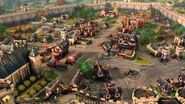 An English town in Age of Empires IV, featuring new units including those which patrol on the walls.