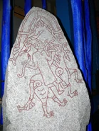 A depiction believed to be of a jotunn, possibly Hyrrokkin, from the Hunnestad Monument, 10th-century