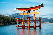 A photo of Itsukushima Gate, a famous Torii Gate located outside Itsukushima Island near Hiroshima, Japan