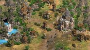 An Armenian town showing off the Armenian Wonder. Additionally, Warrior Priests are stationed by the Fortified Church, and cloaked archers (Composite Bowmen) scattered around the city, and a decorative Chapel is present in the bottom left corner.
