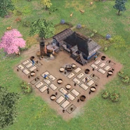 A Sake Brewery and five Toko-Koji Mats being worked by Villagers