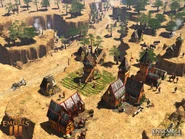 Pre-release screenshot of Age of Empires III showing a Russian colony. It is possible to notice the early Russian flag that would be used in the game on the top of the Mill.