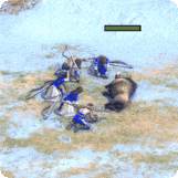 Villagers gathering from a Boar in Age of Empires II: Definitive Edition.