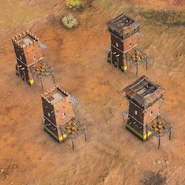 Malian Arrowslits.png (1.18 MB) Toll Outposts with (right) and without (left) Javelin Emplacements