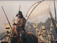 Yamada Tatewaki dans Nobō no Shiro (2012), présentant des ailes attachées à son dos.