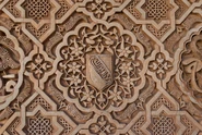 Nasrid coat of arm.jpg (7.58 MB) Bas-relief of the coat of arms of the Nasrid dynasty on a wall of Alhambra palace, Granada, Spain
