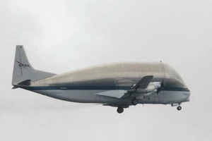 The Super Guppy flying near Seattle in its NASA livery