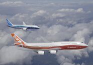 boeing 747 8i next to a 787 dreamliner