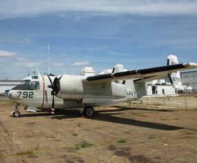 A C-1A Trader with twin tails on display at the Quonset Air Museum.