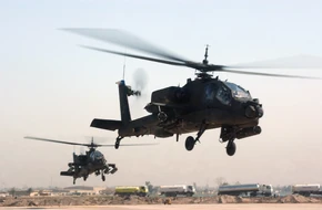A pair of Apaches flying over Iraq in 2007.