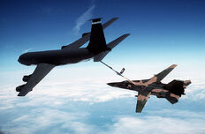 A F-111 being refueled by a KC-135E Stratotanker