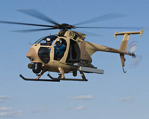 An AH-6 in flight.