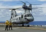 CH-46 Sea Knight helicopter approaches the flight deck of the amphibious assault ship USS Bonhomme Richard (LHD 6)