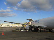 ZK-PAT being loaded at Auckland Airport.