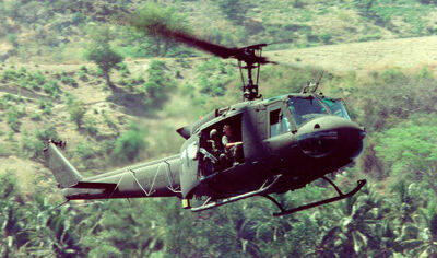 A UH-1 Huey in flight.