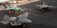An image showing all three F-35's together. The A variant is in the foreground, the B is to the left, and the C variant is in the background