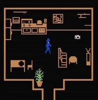 A room where you find the camera. In the final version, the camera is in a hallway.