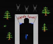 Three stick dolls above the Candy Tunnel, possibly representative of him, Sandra, and Angel.