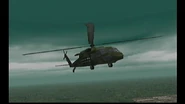 The UH-60 Black Hawk on its rescue mission above the camp perimeter.