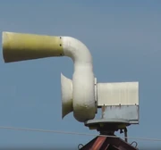 A gen-1 Allertor, located in New Hampton, IA. Note the enlongated motor cover and gear-driven rotator.