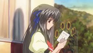 Minagi Tohno reading a book. Screenshot from the anime