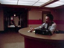 Security guard-Santinis millions.jpg (63 KB) This security guard has a line or two. Barron addresses him as "George". Could he be Smitty?