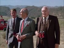 There's supposed to be a Trent Dolan playing a "supervisor". This could be him, supervising the demo of Airwolf II for Zeus and the Secretary of Defense.