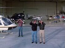 Nice shot of the hangar at the beginning of the episode. Left to right there is a Jetranger, T-6 Texan, T-34 Mentor, Aero Commander 500 and T-38 Talon.